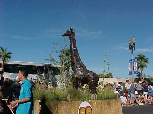 Parade with giraffe float