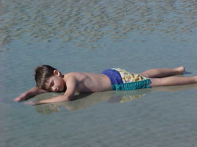 Child on beach / sand