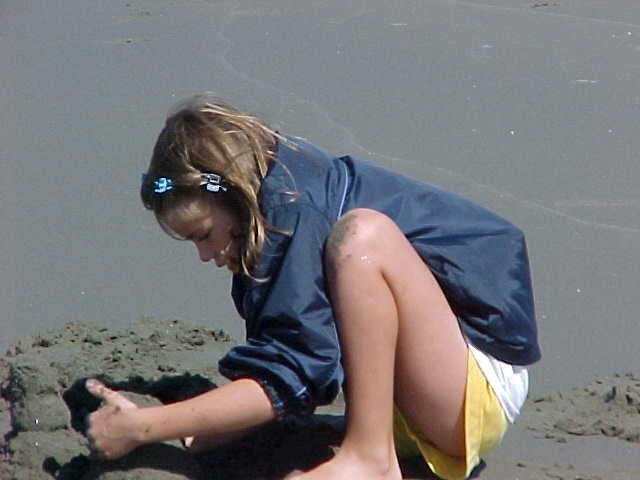 Child on beach / sand