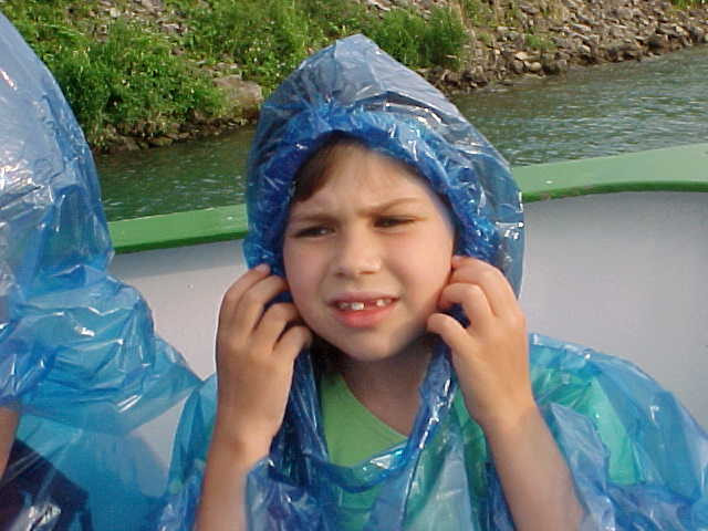 Child in rain poncho